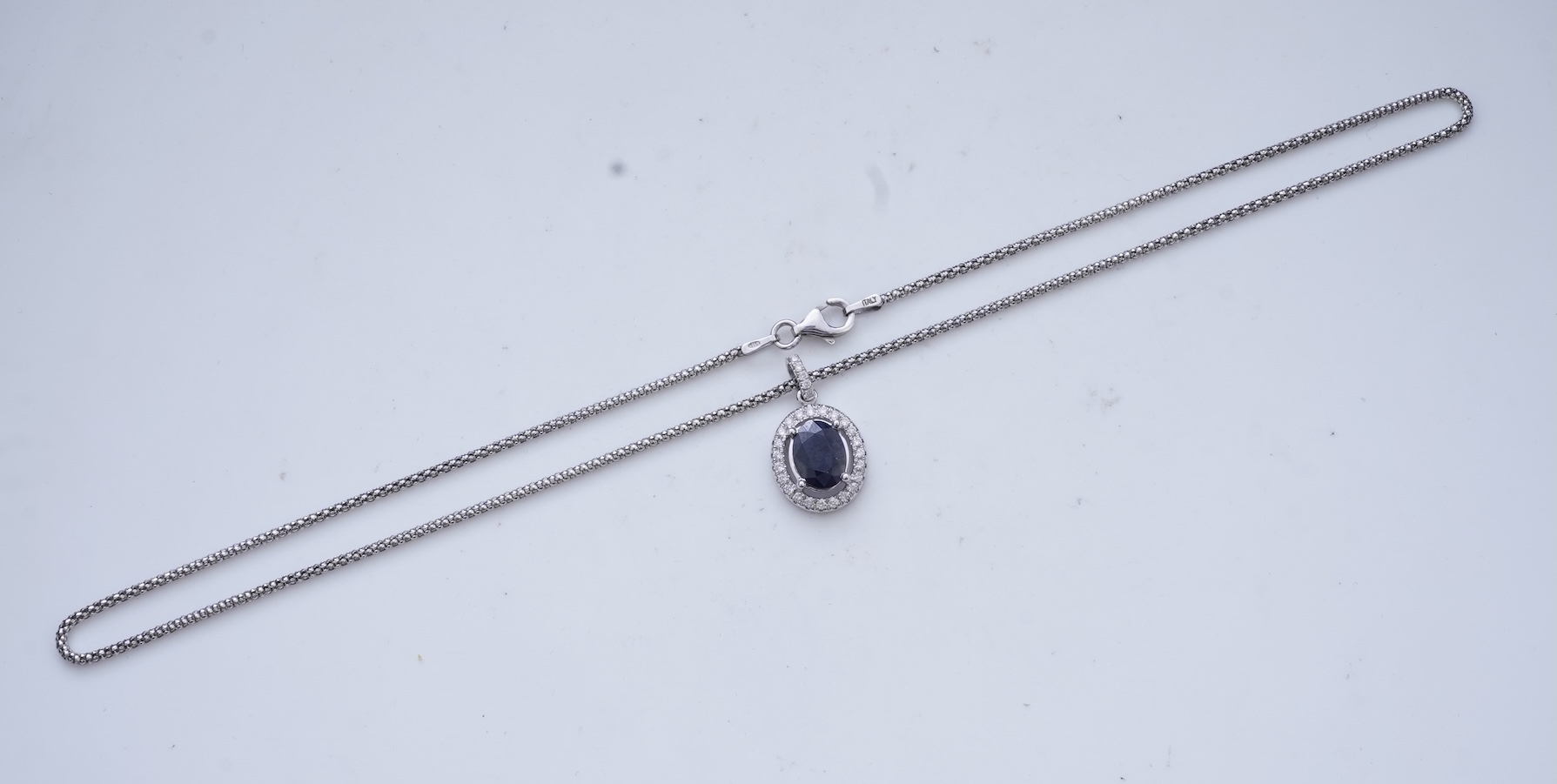 A sapphire and diamond demi-parure